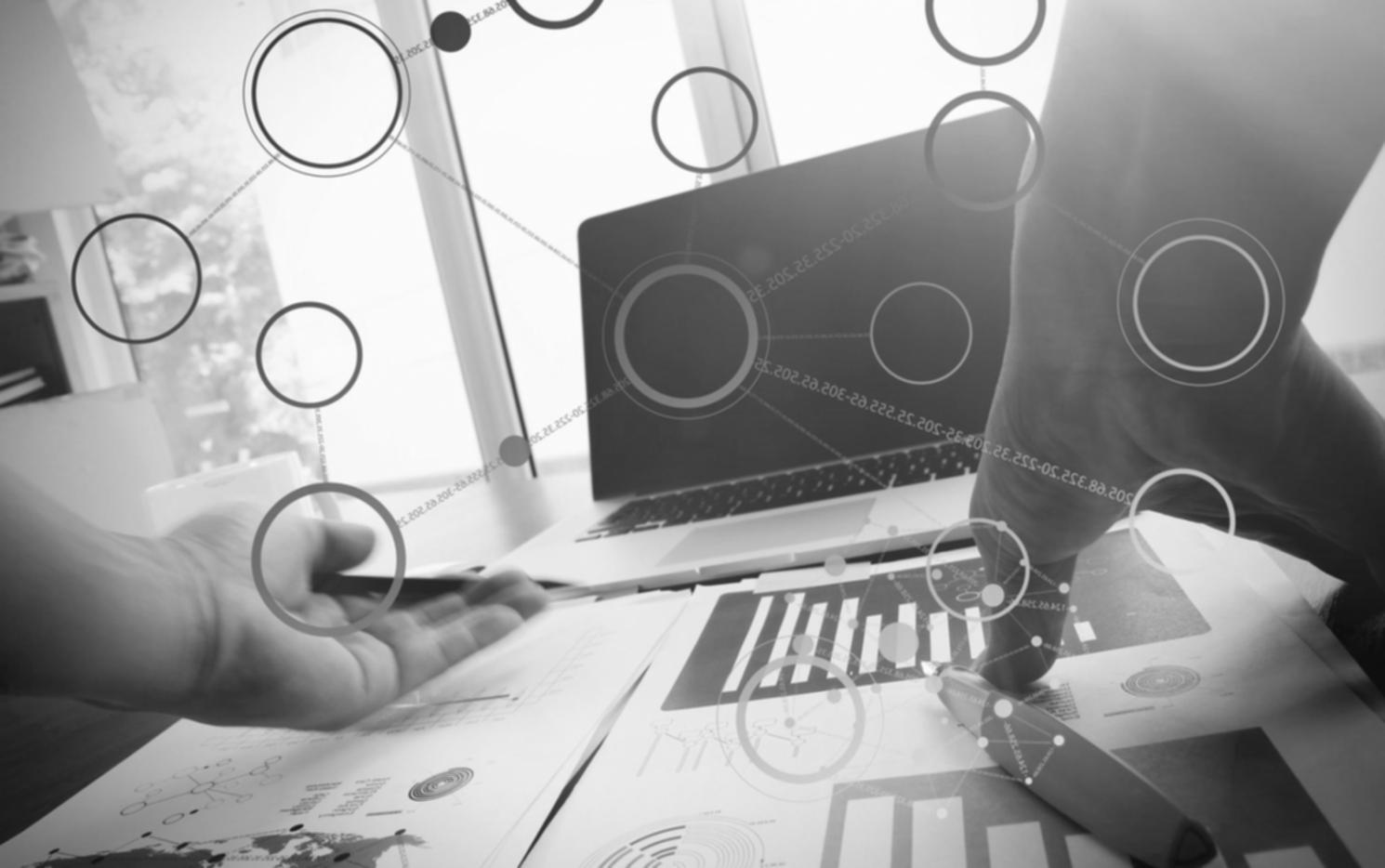 Student working on 3D environment project with multiple reference images and modeling software open